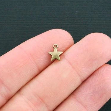 20 Star Antique Bronze Tone Charms 2 Sided - BC1331