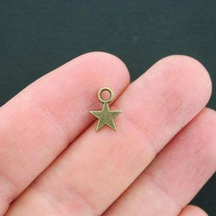 20 Star Antique Bronze Tone Charms 2 Sided - BC594