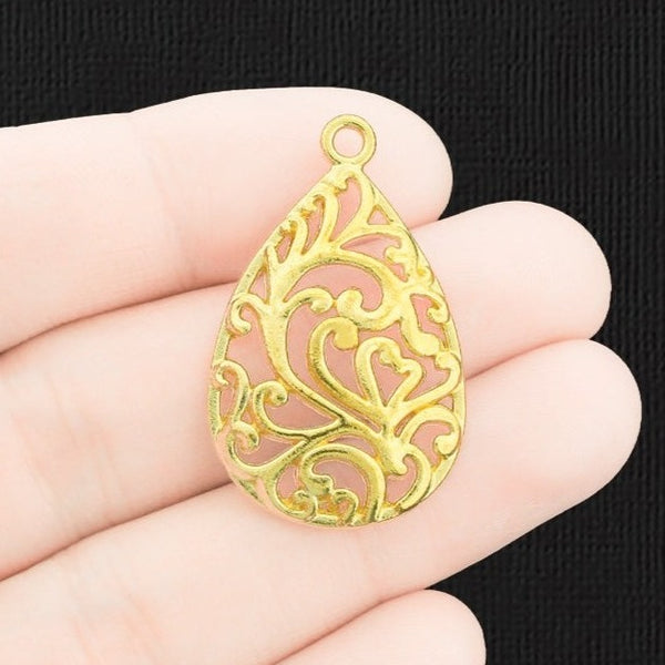 6 Filigree Drop Gold Tone Charms - GC856