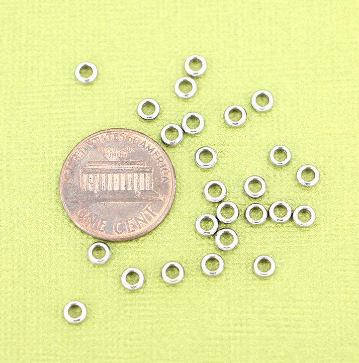 Anneau Intercalaire Perles 4mm x 1.5mm - Acier Inoxydable Argenté - 25 Perles - FD526