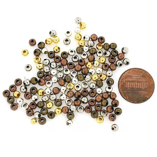 Perles intercalaires rondes 4mm x 4mm - Assortiment de tons bronze, cuivre, or et argent - 250 perles - FD373