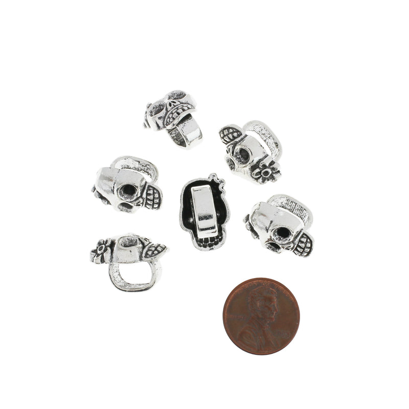 4 Skull Antique Silver Tone Charms - SC693