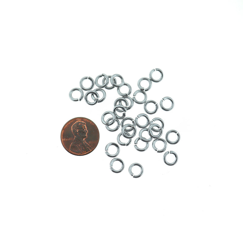 Anneaux en aluminium argenté 7,4 mm x 1,6 mm - Calibre 14 ouvert - 100 anneaux - MT026