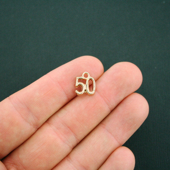 4 Number 50 Gold Tone Charms - GC448