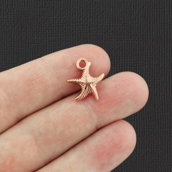 12 breloques étoile de mer ton or rose 2 faces - GC217