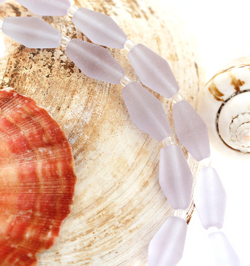 Perles de verre de mer de culture toupies 17 mm x 8 mm - Lavande givrée - 1 brin 11 perles - U139