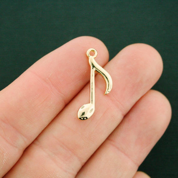4 Music Note Gold Tone Charms - GC838