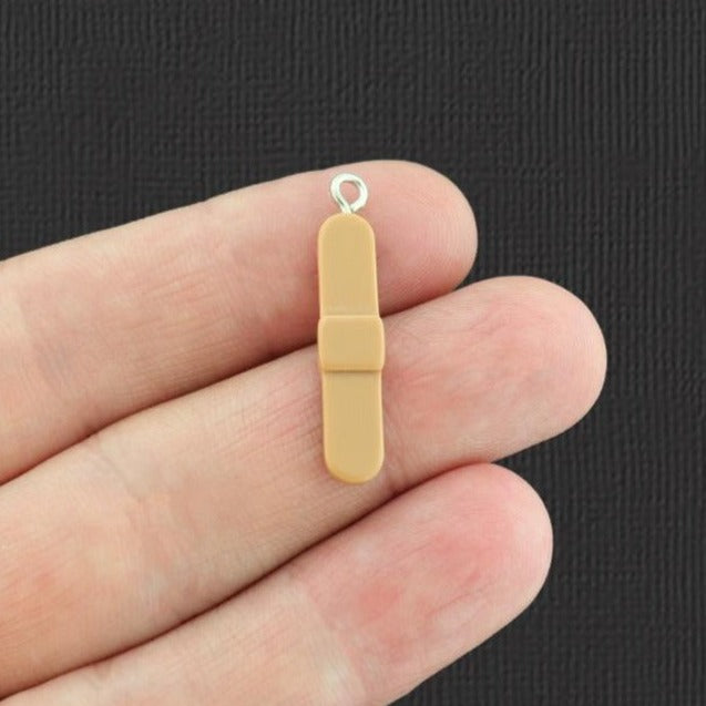 4 Bandage Resin Charms - K058