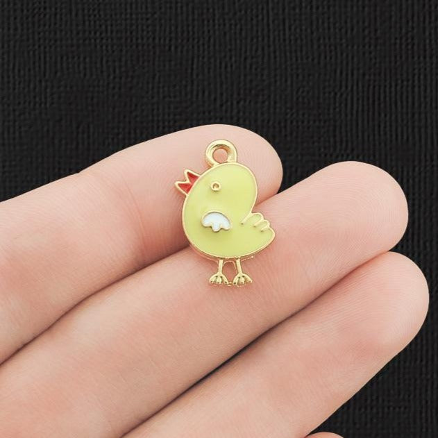 4 breloques en émail doré poussin - E887
