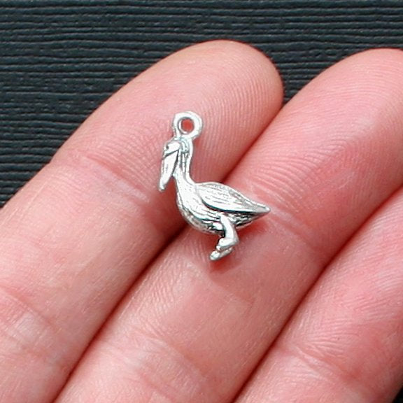 4 breloques argentées antiques pélican 3D - SC1835