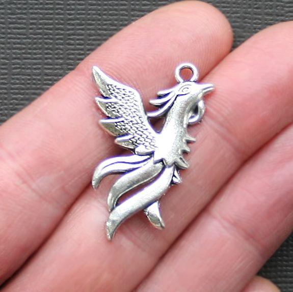 4 breloques argentées antiques Phoenix - SC2380