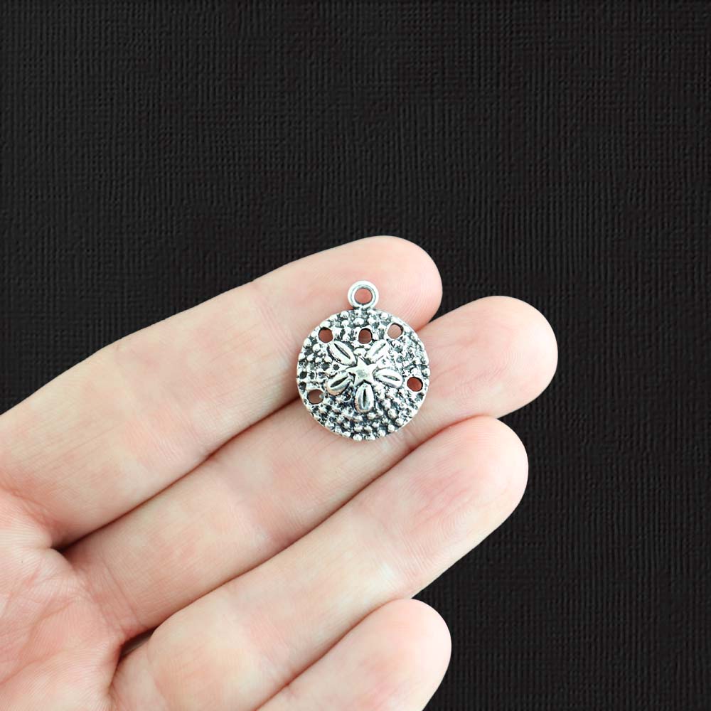 4 breloques argentées antiques en forme de dollar de sable - SC1775