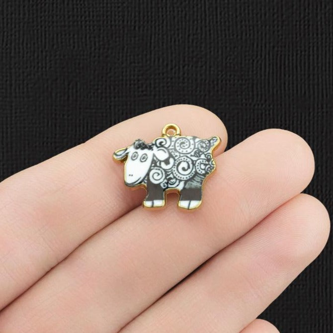 Breloques en émail doré 4 moutons - E060