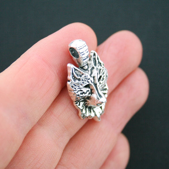 4 Wolf Antique Silver Tone Charms  - SC5038