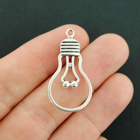 4 Lightbulb Antique Silver Tone Charms 2 Sided - SC7661