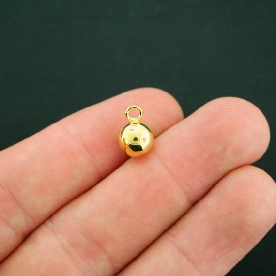 4 Round Ball Gold Tone Charms 3D - GC296