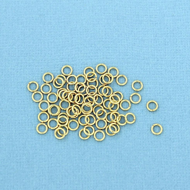 Anneaux en acier inoxydable doré 4 mm x 0,7 mm - Calibre 21 ouvert - 50 anneaux - SS041