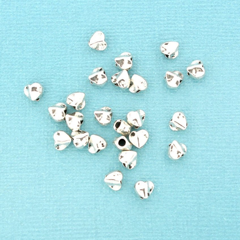 Perles en métal entretoise cœur martelé 6 mm x 5 mm x 4 mm - ton argent antique - 50 perles - SC7477