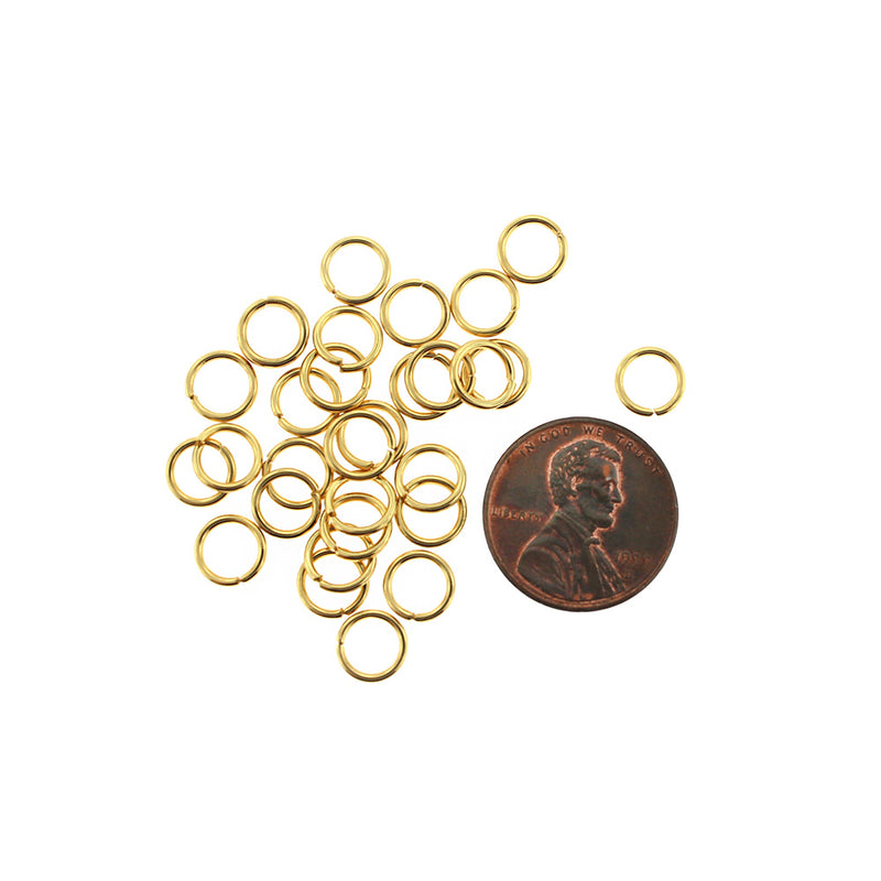 Anneaux en acier inoxydable doré 7 mm x 1 mm - Calibre 18 ouvert - 20 anneaux - J196