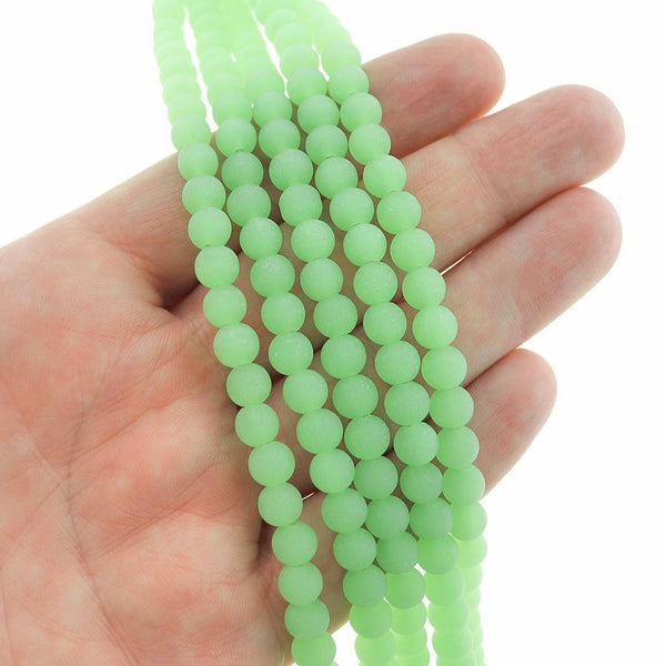 Perles rondes en verre de mer de culture 6 mm - Vert menthe - 1 rang 32 perles - U209