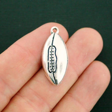 5 Football Antique Silver Tone Charms - SC7029