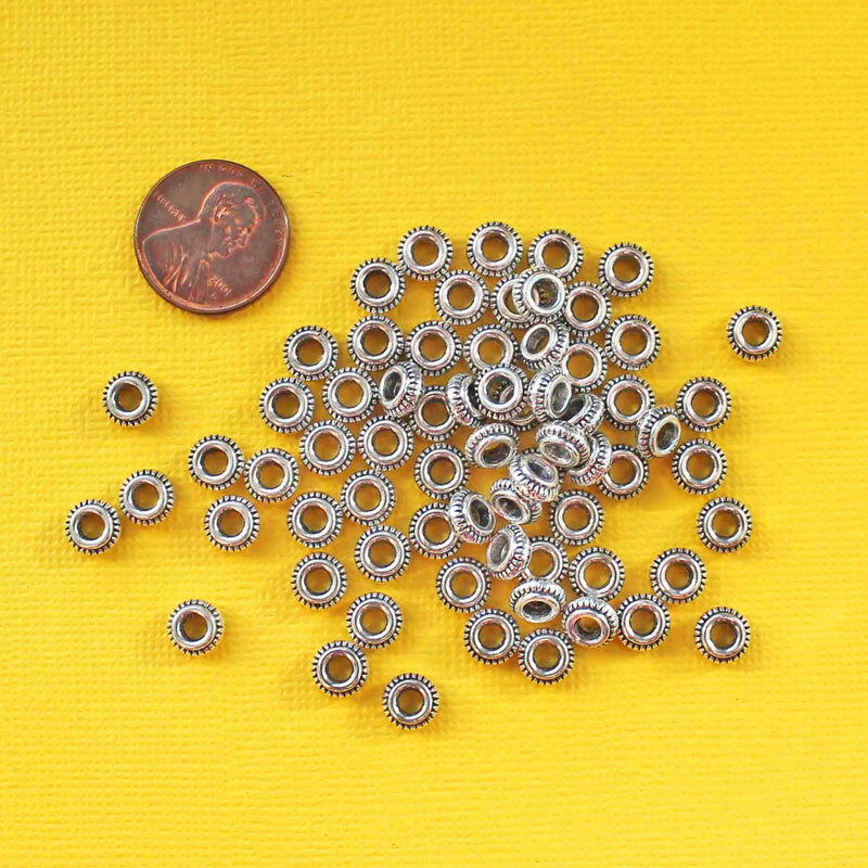 Perles d'espacement rondes plates 7 mm x 3 mm - ton argent - 50 perles - SC5755