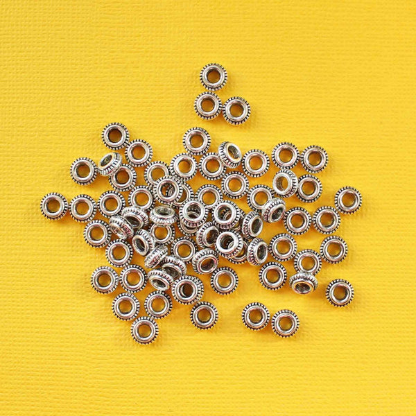 Flat Round Spacer Beads 7mm x 3mm - Silver Tone - 50 Beads - SC5755