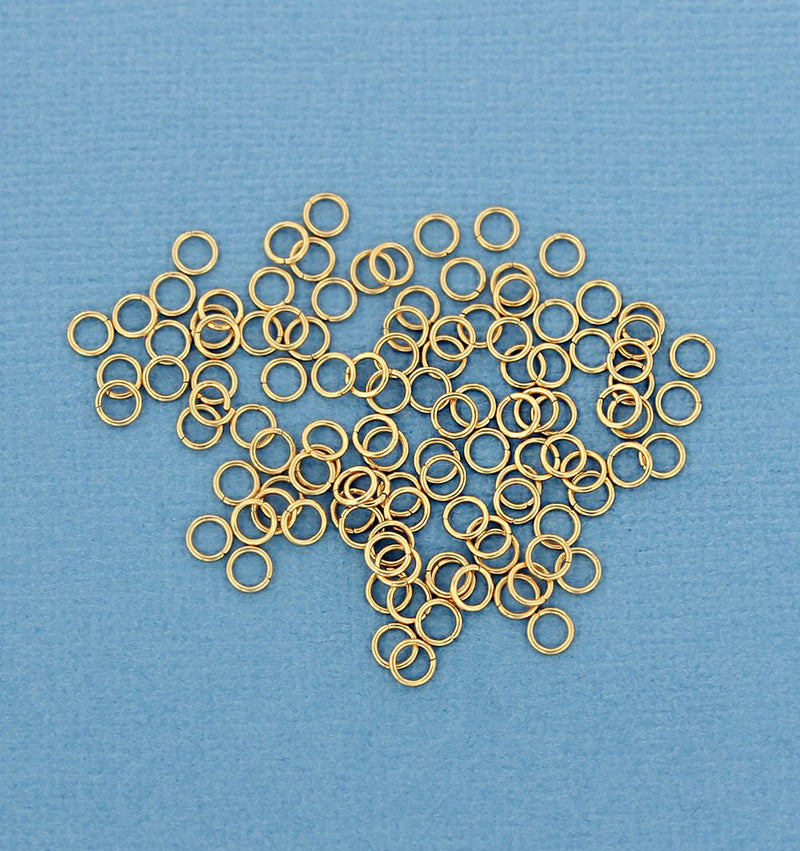 Anneaux en acier inoxydable doré 4 mm x 0,6 mm - Calibre 23 ouvert - 50 anneaux - SS033