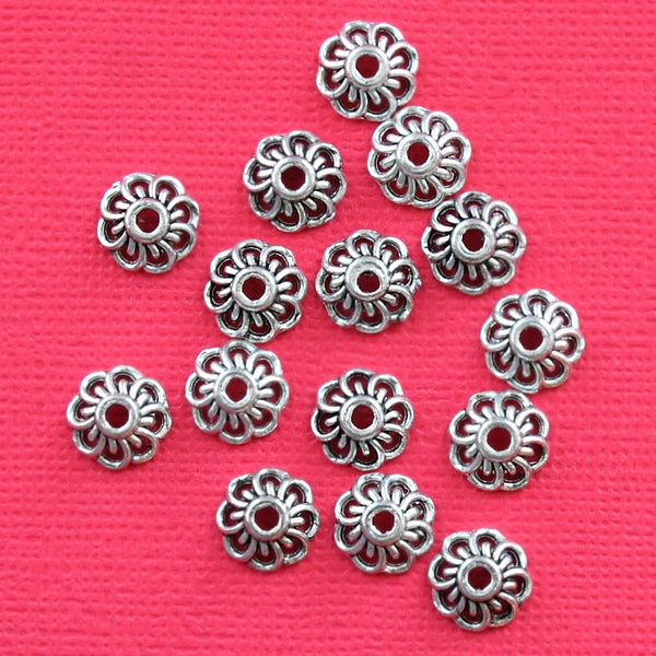 Capuchons de perles de ton argent antique - 10 mm x 4 mm - 100 pièces - FD259