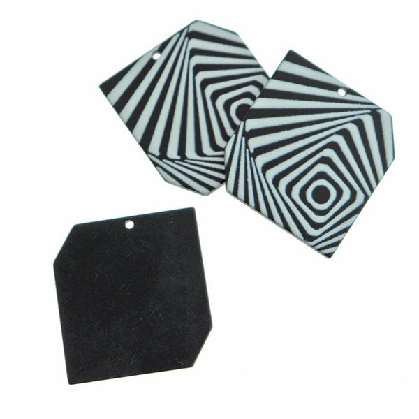 2 breloques acryliques géométriques noires et blanches - K572