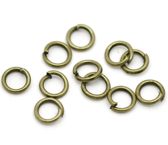 Anneaux de jonction ton bronze antique 5 mm x 0,9 mm - Calibre 19 ouvert - 1000 anneaux - J016