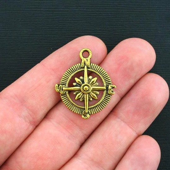 6 Compass Antique Gold Tone Charms - GC272