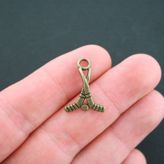 6 Hockey Antique Bronze Tone Charms 2 Sided - BC170