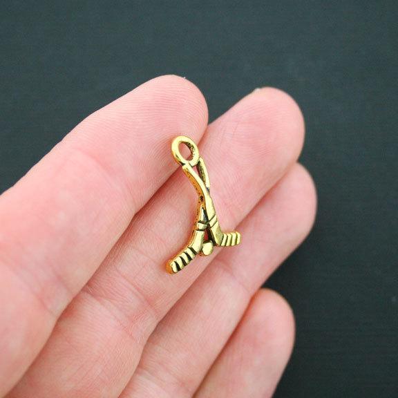 6 Hockey Antique Gold Tone Charms - GC506