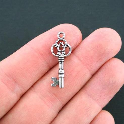 6 Key Antique Silver Tone Charms 2 Sided - SC4377
