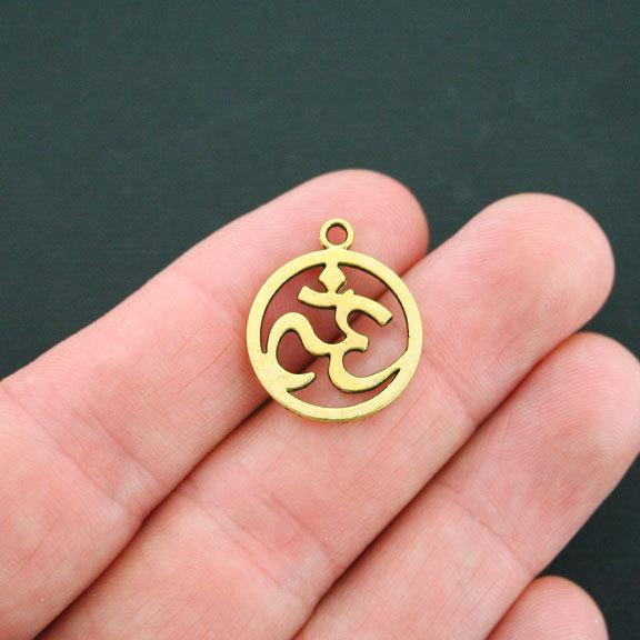 6 Om Antique Gold Tone Charms - GC007