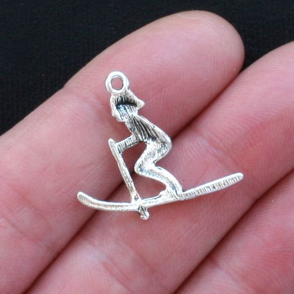 4 Skier  Antique Silver Tone Charms - SC2885