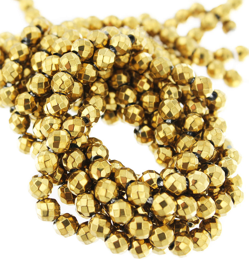 Perles d'Hématite à Facettes 6mm - Or Galvanisé - 1 Rang 68 Perles - BD1678