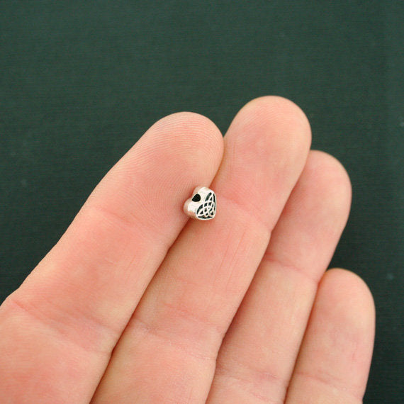 Perles en métal entretoise coeur celtique 6,5 mm x 6,1 mm - ton argent - 25 perles - SC7572
