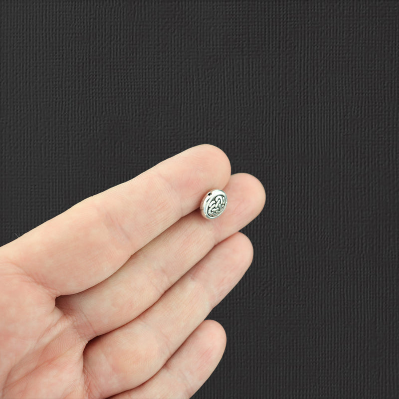 Perles d'espacement de noeud celtique 10 mm x 3,9 mm - ton argent antique - 15 perles - SC3386