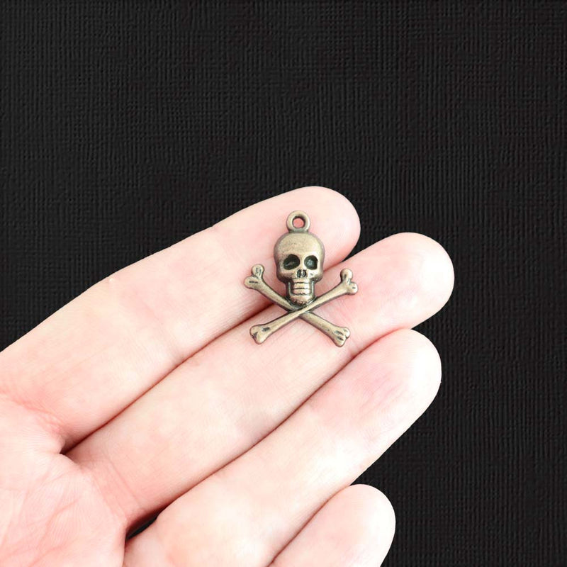 10 Skull and Crossbones Antique Bronze Tone Charms - BC858