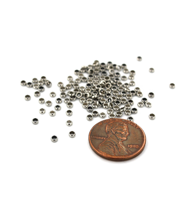 Perles d'espacement rondes plates en acier inoxydable 2,5 mm x 1 mm - ton argent - 25 perles - FD683