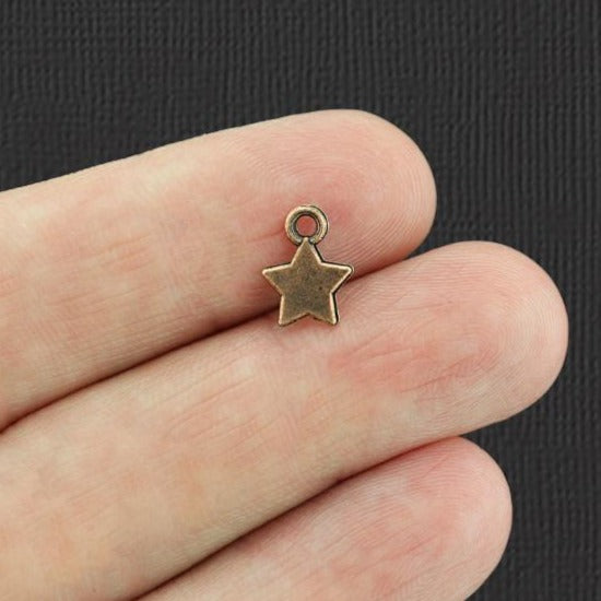 20 Star Antique Copper Tone Charms 2 Sided - BC168