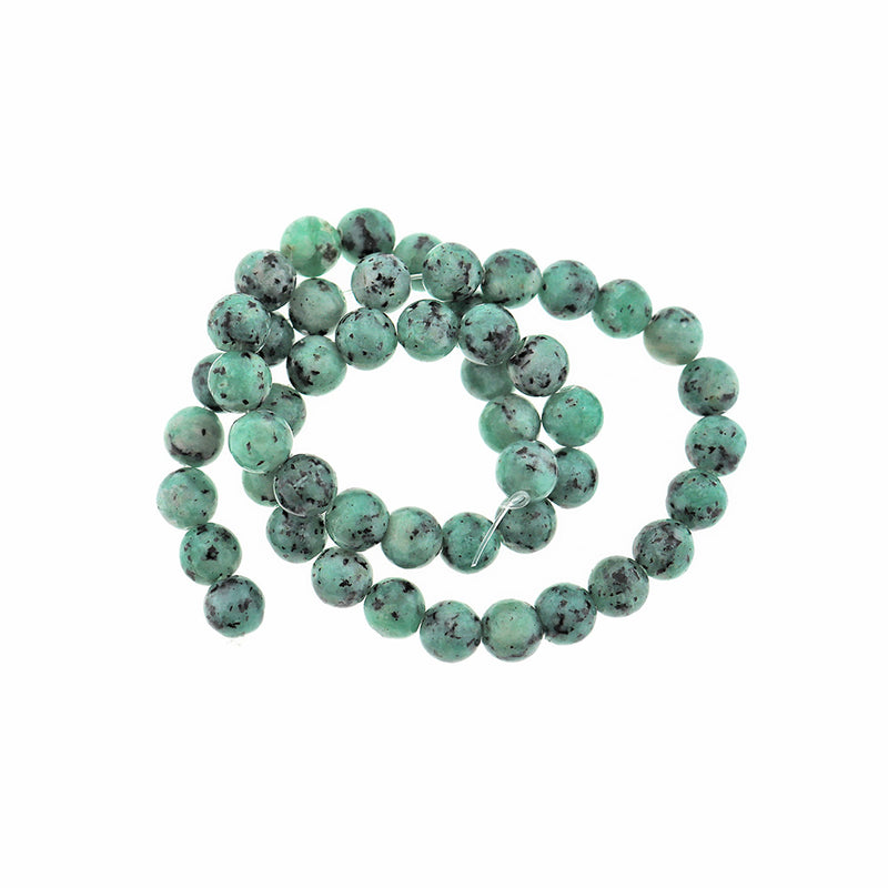Perles rondes imitation pierres précieuses 8 mm - Bleu sarcelle avec des taches noires - 1 brin 50 perles - BD2273