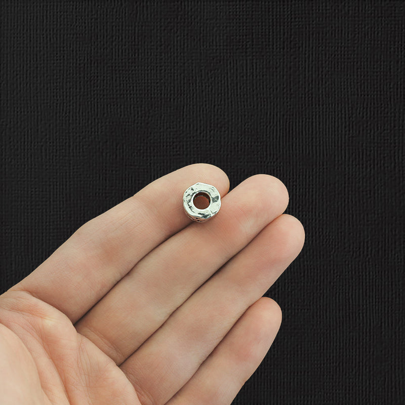 Perles d'espacement tourbillonnantes 10 mm x 7 mm - ton argent antique - 10 perles - SC3202