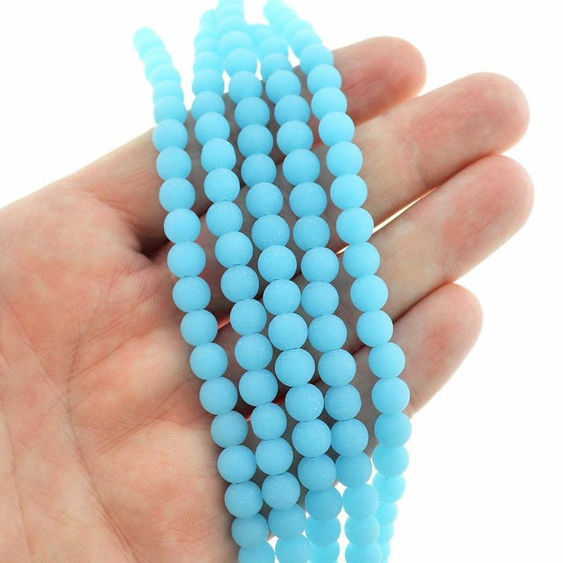 Perles rondes en verre de mer de culture 6 mm - Bleu ciel givré - 1 rang 32 perles - U210