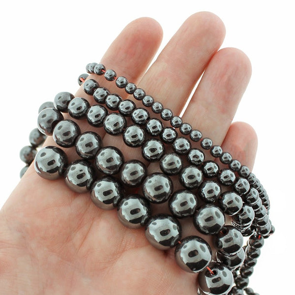 Perles d'hématite synthétiques rondes 4mm - 12mm - Choisissez votre taille - Noir - 1 brin complet de 15" - BD1842