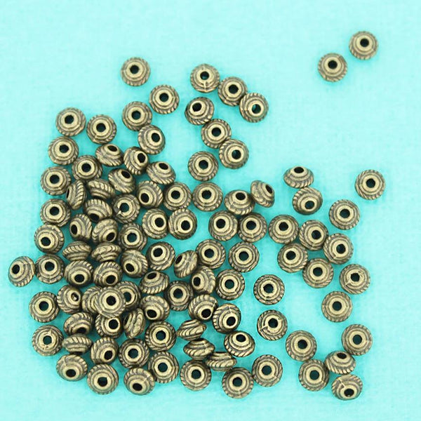 Perles d'espacement rondes 5 mm x 3 mm - ton bronze - 50 perles - BC1322