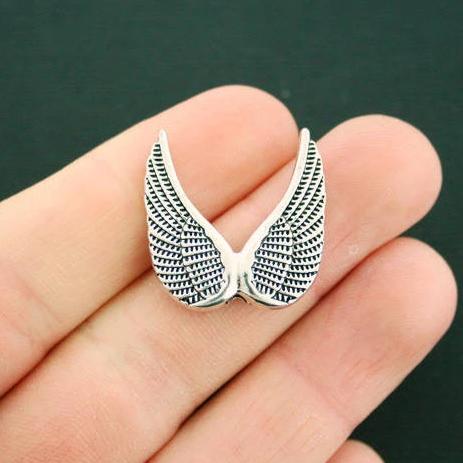 Perles d'espacement d'ailes d'ange 25 mm x 24 mm - ton argent - 20 perles - SC6265
