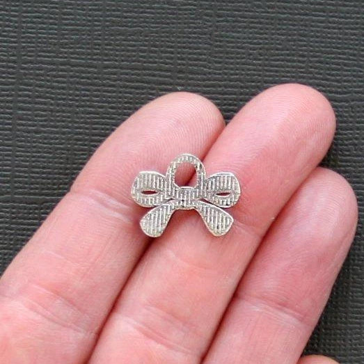 8 Bow Antique Silver Tone Charms - SC1654